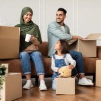 happy-islamic-family-packing-or-unpacking-boxes.jpg
